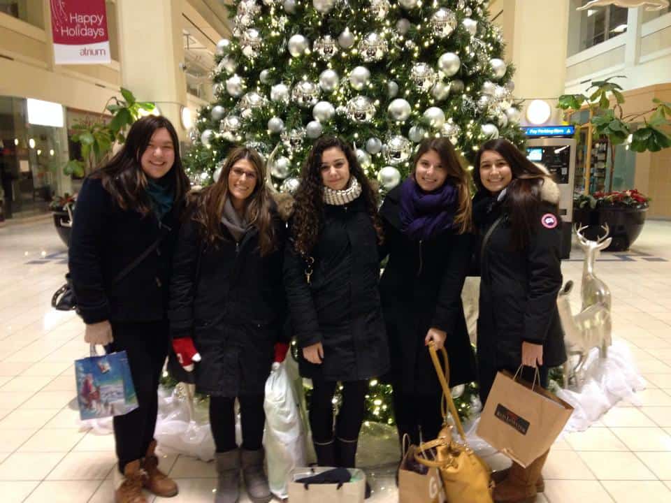 2013: A Year in Review 13 Posing with friends in front of a Christmas tree