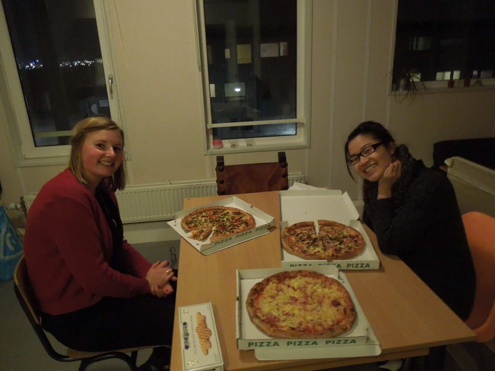 Arriving in Amsterdam to Study Abroad 4 Eating pizza with my roommates in Amsterdam
