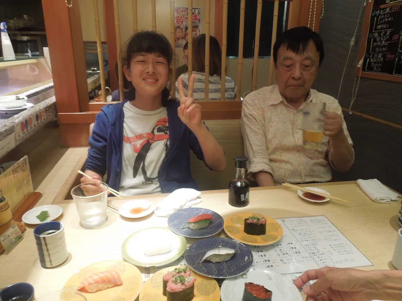 Adventures Around Tokyo with the Kosekis 11 Yuko & Mr. Koseki eating sushi