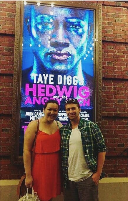 New York City: Must Sees & Maybe Passes 12 Colin and Riana in front of a Broadway poster