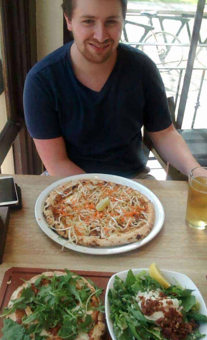 Celebrating Victoria Day in Victoria, BC! 4 Colin posing with pizza in Victoria, BC