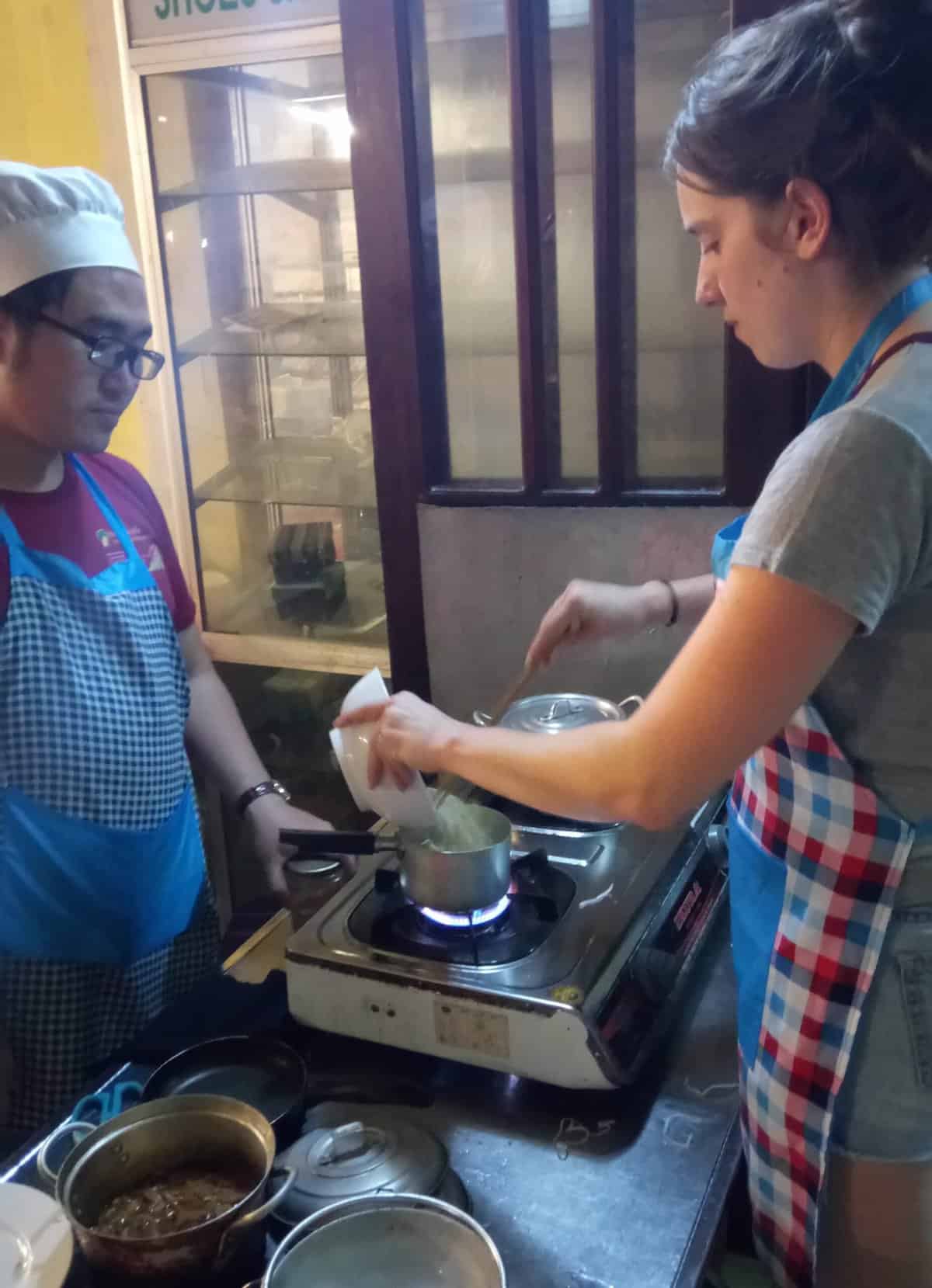 The Disneyland of Vietnam: Hoi An 9 Emilie cooking during our class in Vietnam
