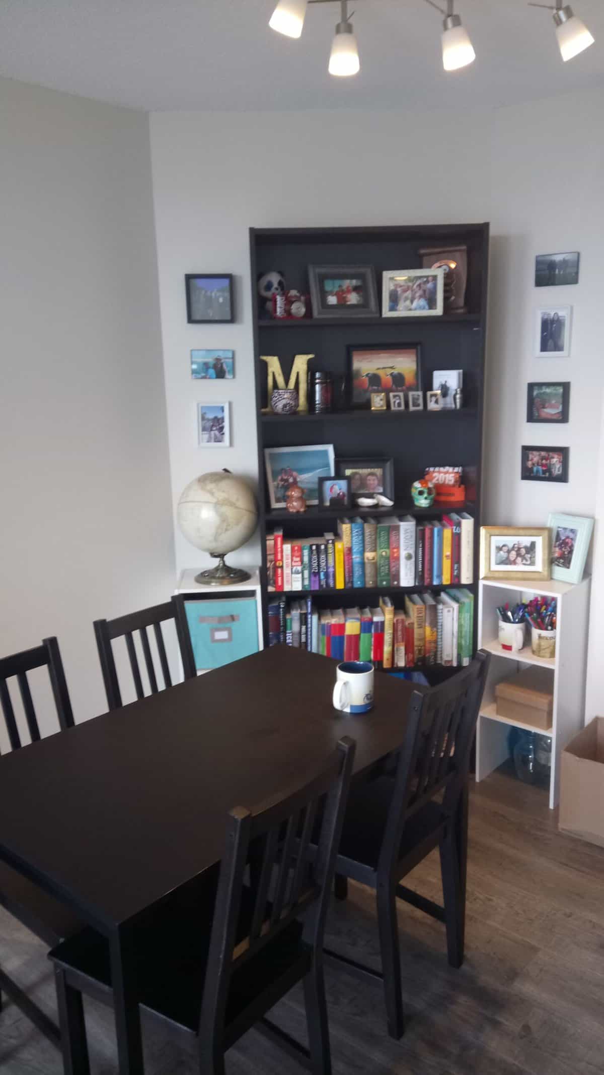 Welcome to Our Home in New Westminster, BC 3 Kitchen table, bookshelf and some artfully arranged photos