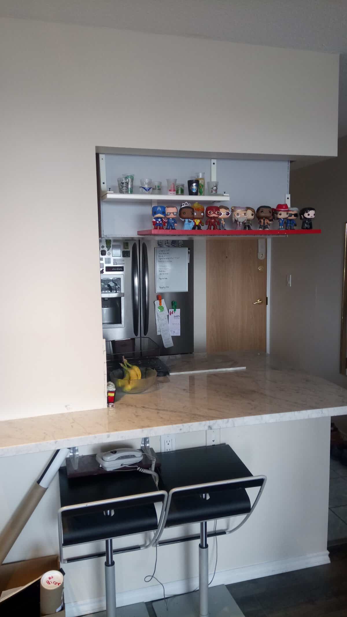 Welcome to Our Home in New Westminster, BC 5 Our collection of Funko Pop Dolls and shot glasses on display
