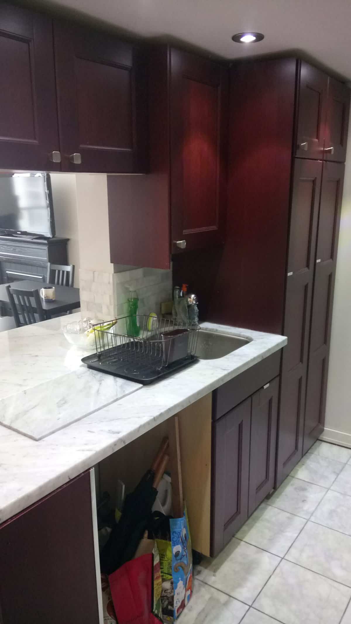 Welcome to Our Home in New Westminster, BC 7 Our kitchen with cabinets and sink