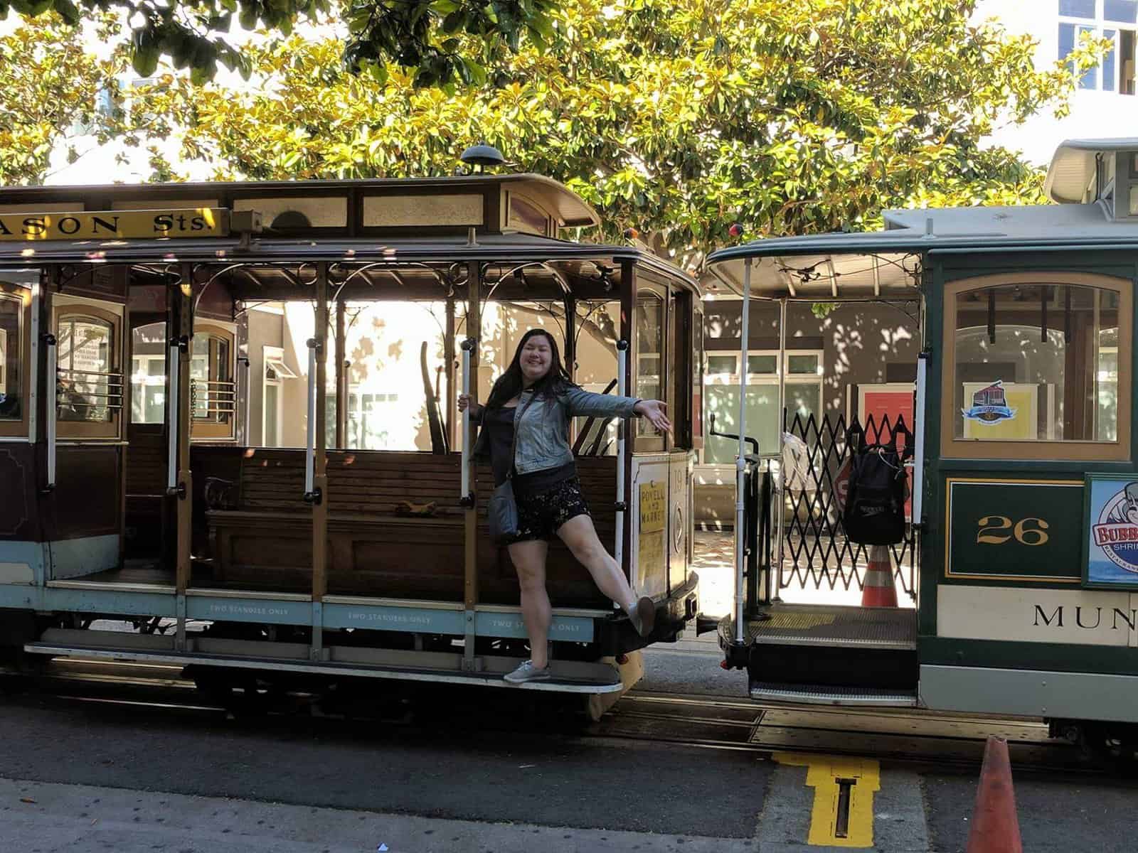 How to Spend Five Days in San Francisco 5 Riana posing on the San Francisco cable car