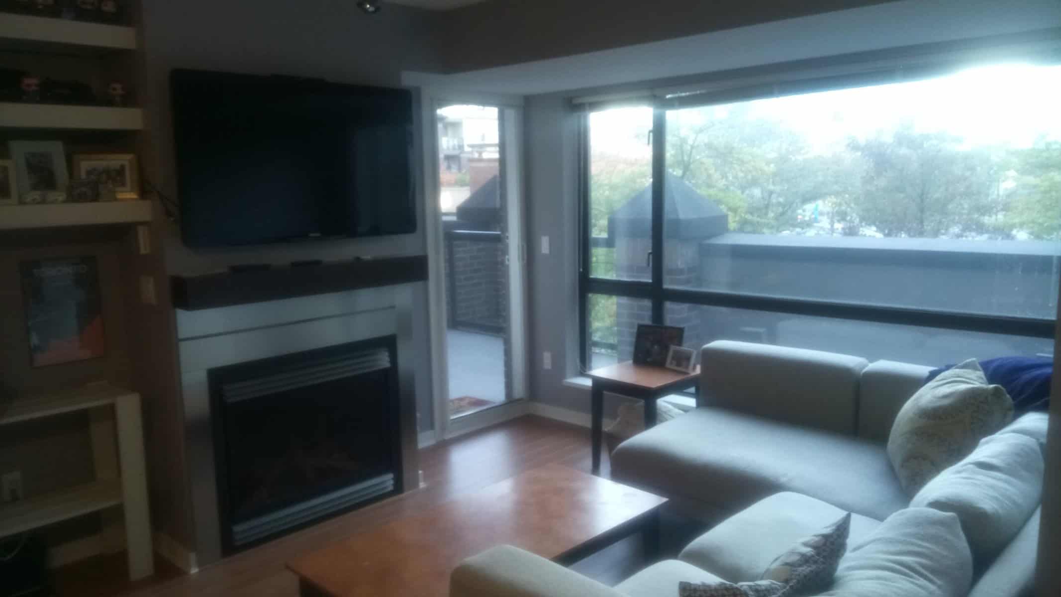Living room and TV in our new apartment in Surrey BC