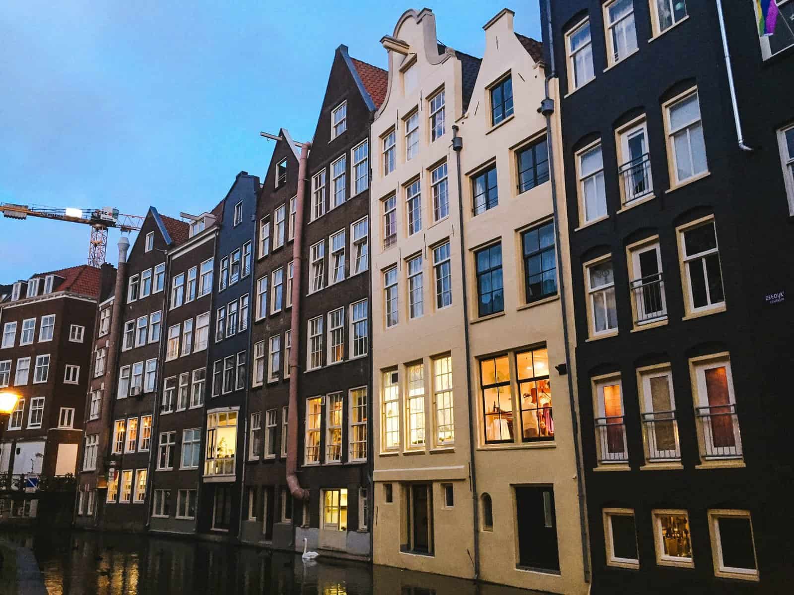Falling Back in Love with Amsterdam 8 Skinny dutch houses on a canal in Amsterdam