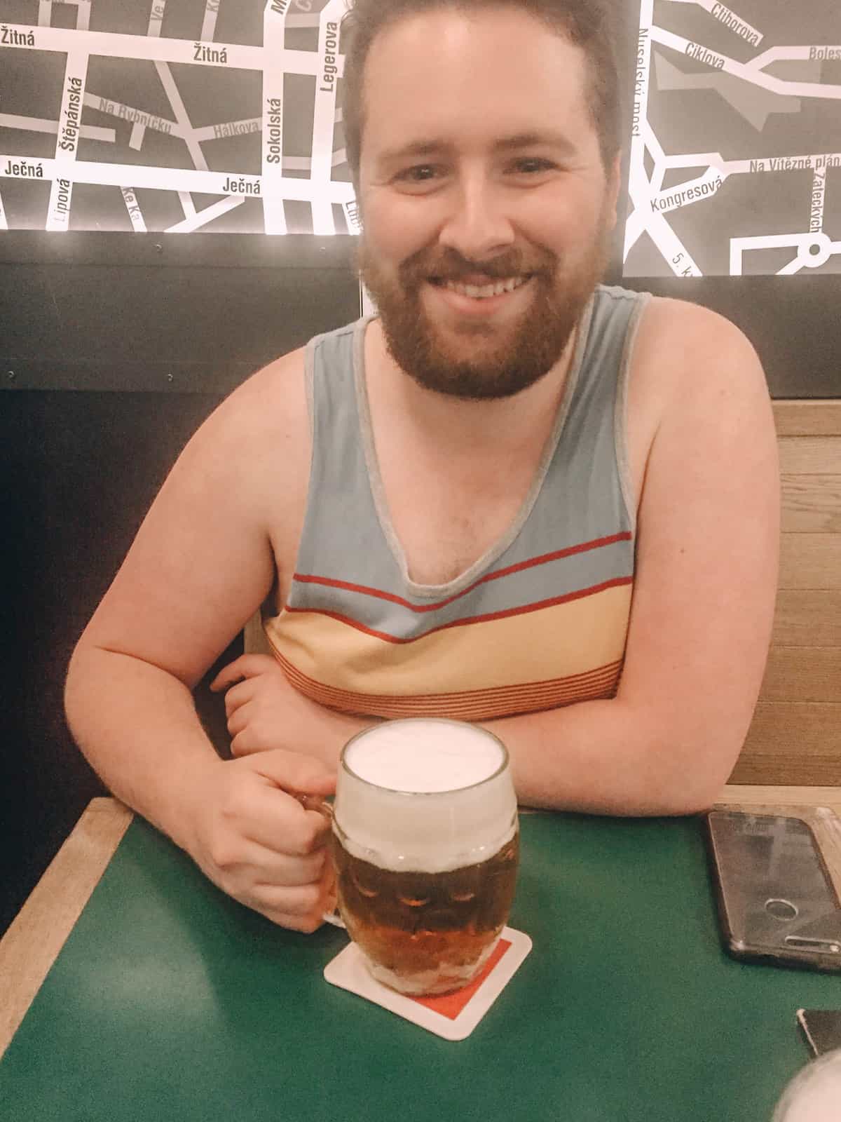 Expat Life: Settling into Our 1st Week Living in Prague 9 Colin drinking his first Czech beer during our expat year in Prague