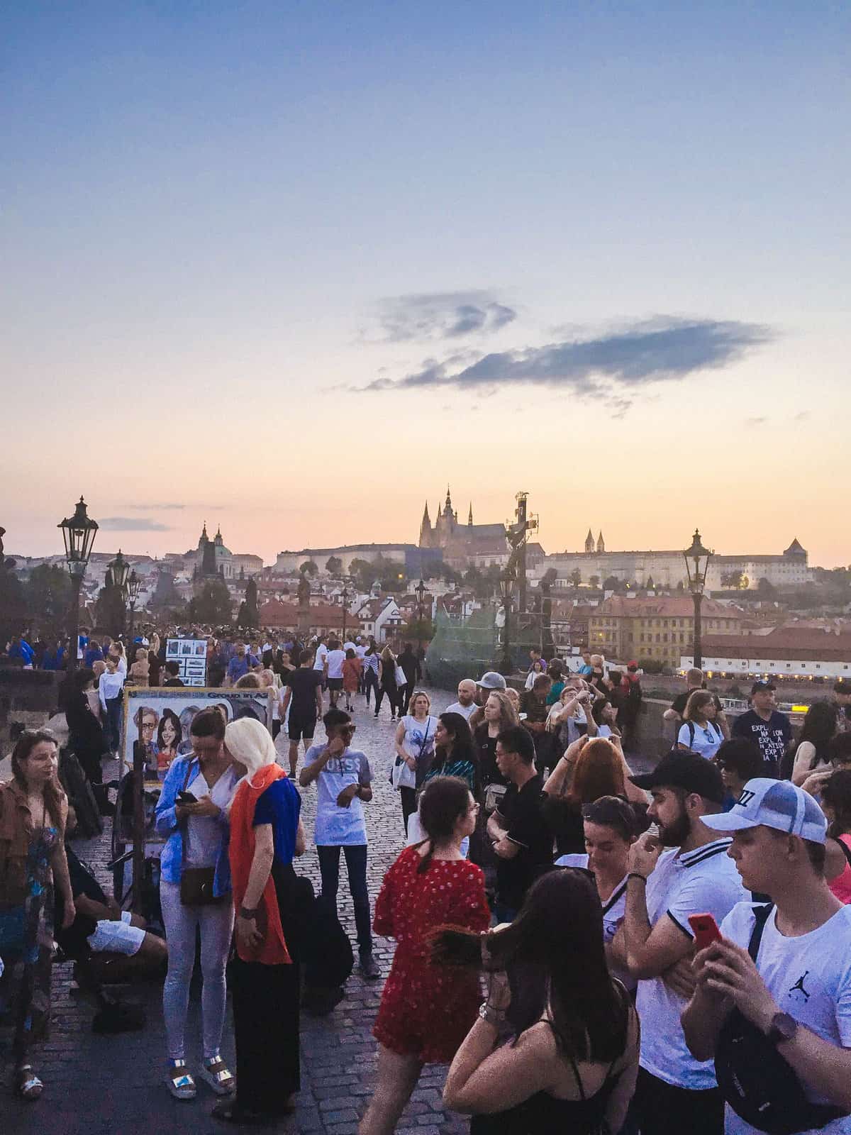 Expat Life: Settling into Our 1st Week Living in Prague 14 Crowds of people on Charles Bridge in the summer in Prague