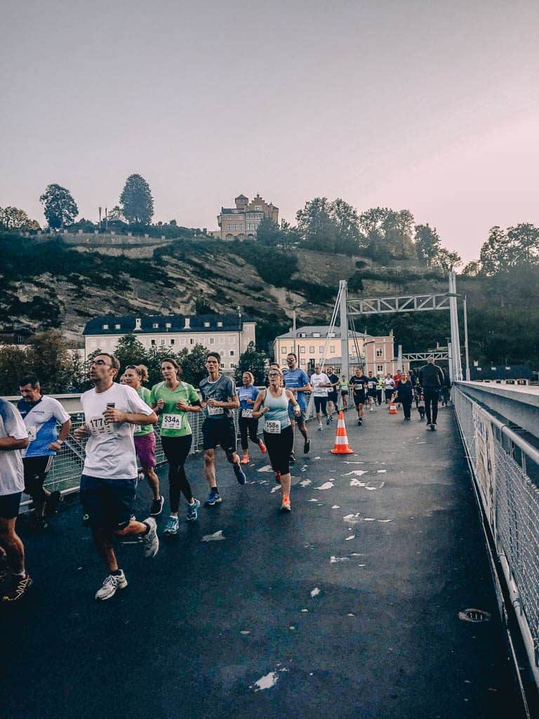 views over the Salzach River with runners