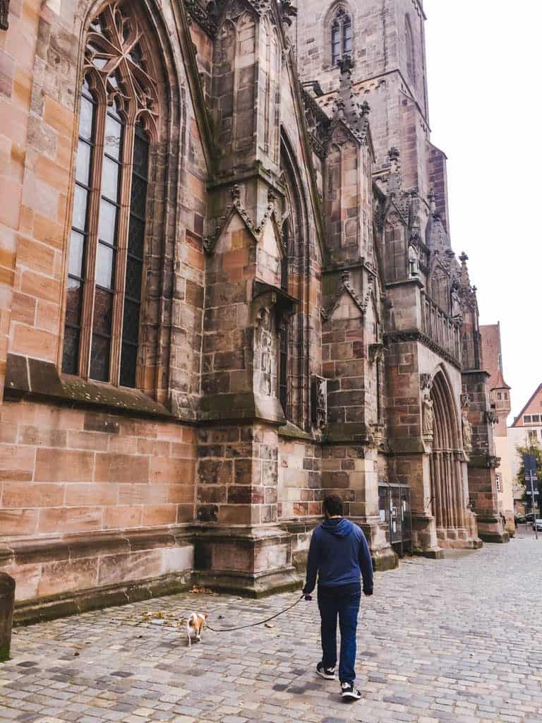 What Is There to Do in Nuremberg? 18 Colin and Ellie walking past St. Sebald or Sebalduskirche in Nuremberg