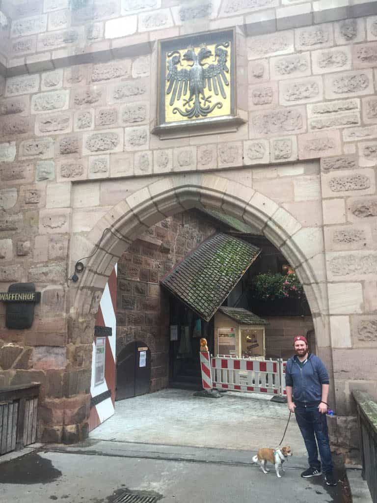 What Is There to Do in Nuremberg? 28 Colin and Ellie posing in front of the entrance to a cute fairytale area of Nuremberg