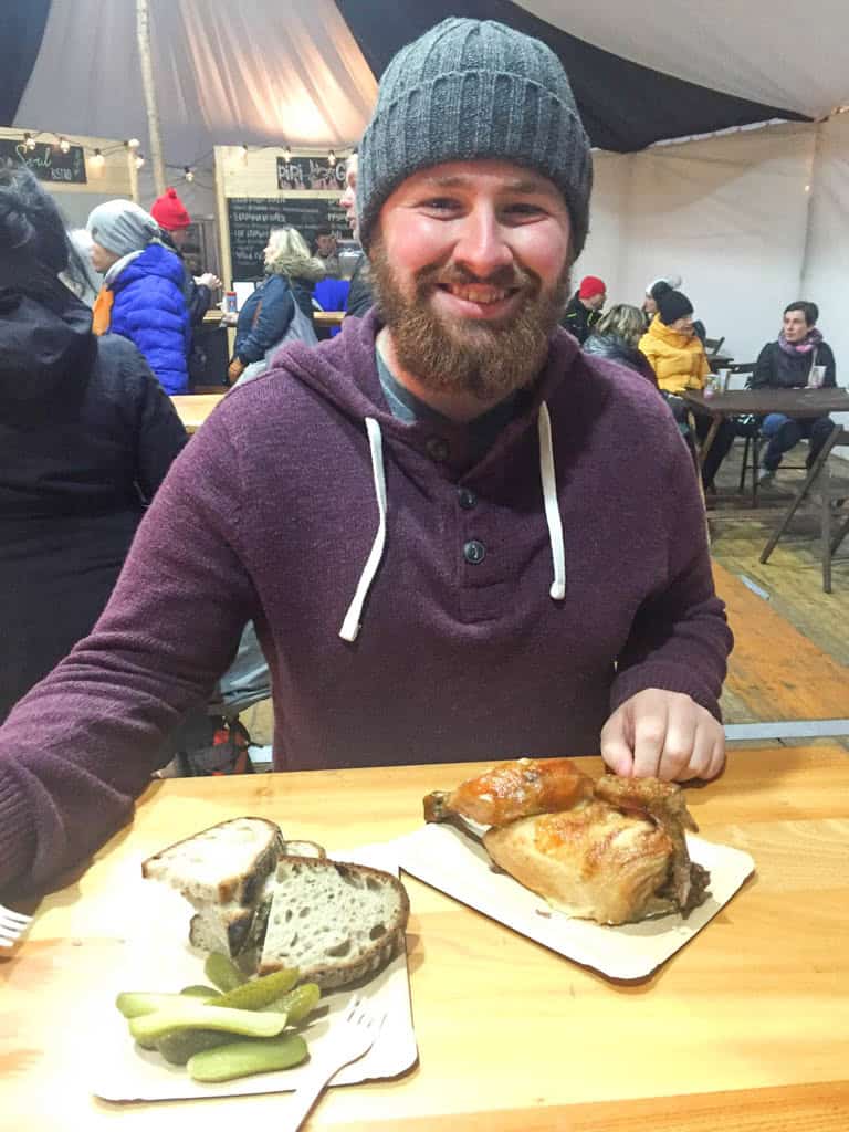 The Ultimate European Christmas Market Road Trip 15 Colin eating food at the Brno Christmas Market