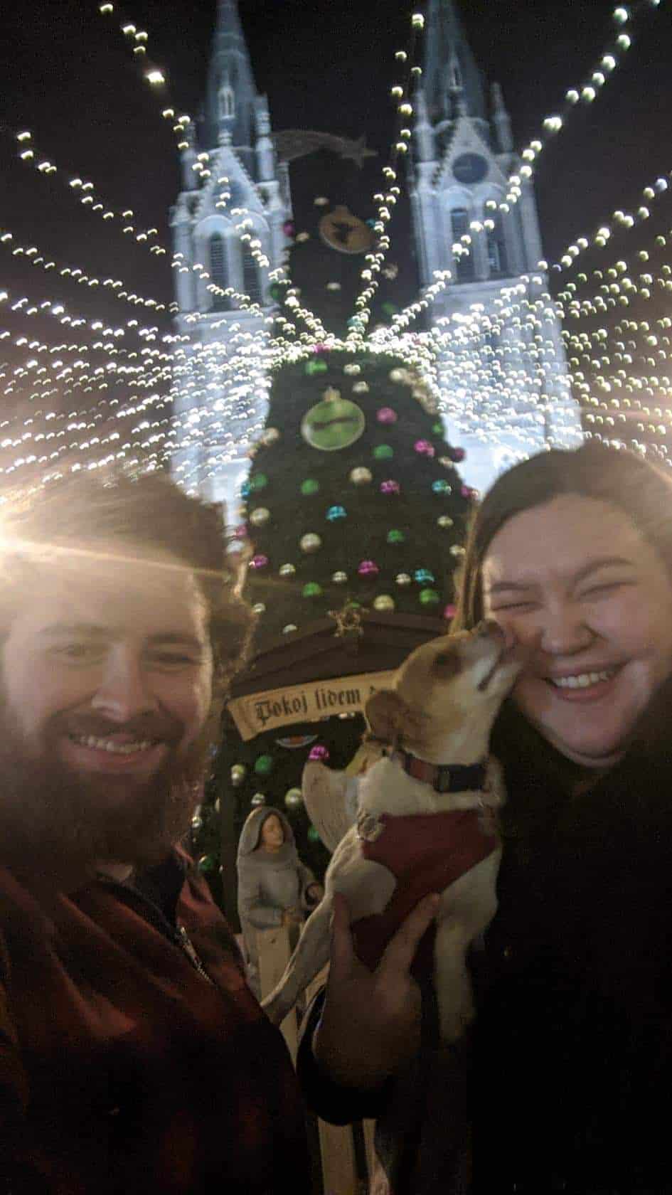 The Ultimate European Christmas Market Road Trip 49 Riana, Colin and Ellie taking a selfie in front of the Christmas tree at Namesti Miru in Prague
