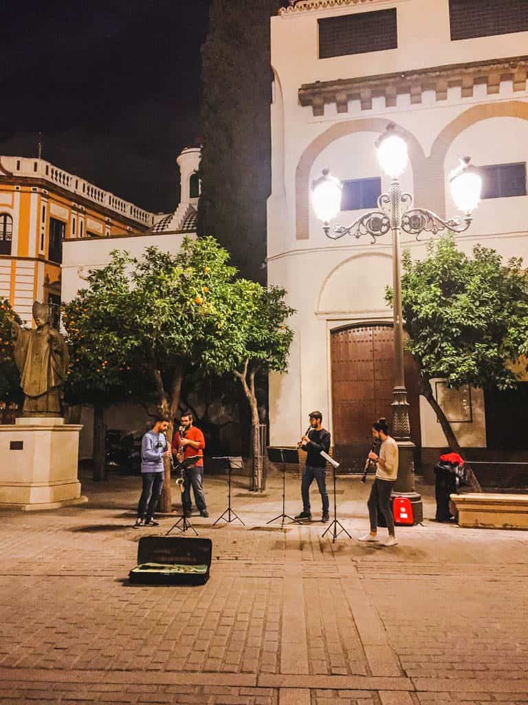 Falling in Love with Seville 28 A quartet playing music in the square in Old Town, Seville