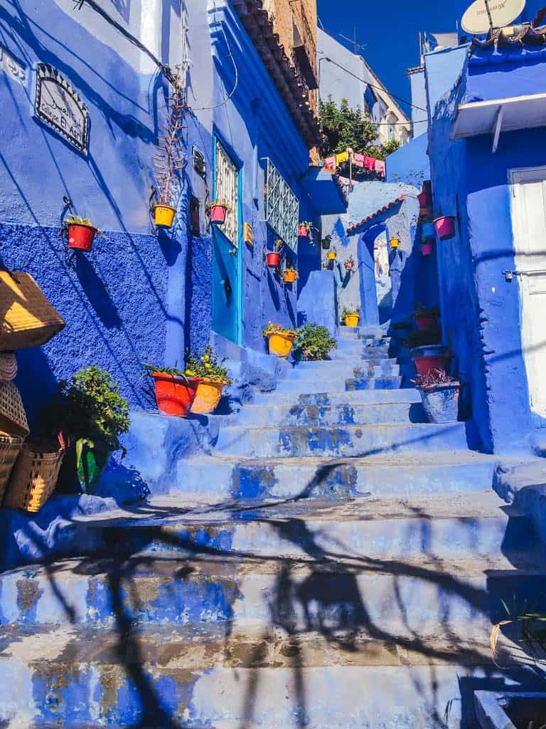 An alleyway showing off the blue walls of Chefchaouen, Morocco