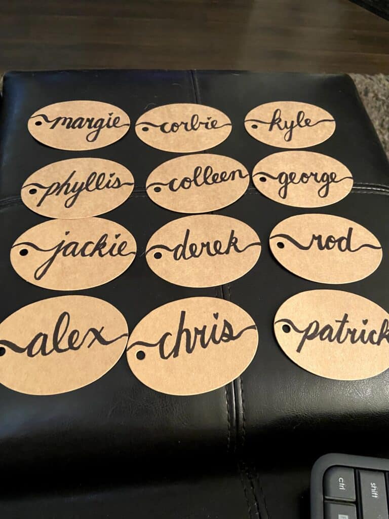 Which Wedding Traditions Did We Actually End Up Skipping? 18 calligraphy assigned seat cards for our wedding ceremony