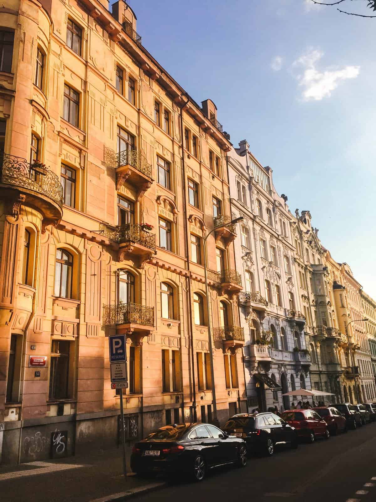 8 Things I Miss About Living in Prague 5 Apartment buildings with ornate windows and balconies in the Vinohrady Prague neighbourhood