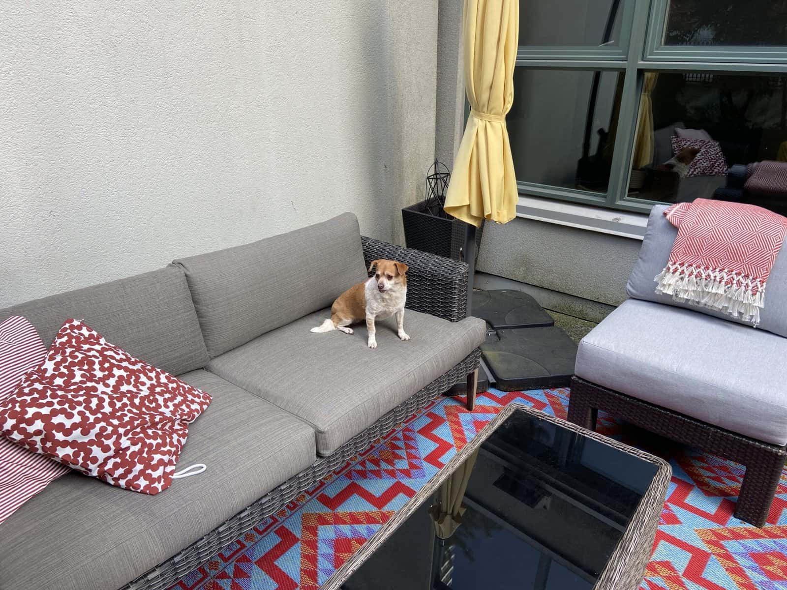 Our Budget Patio Makeover 14 budget patio makeover conversation space with couch and chairs