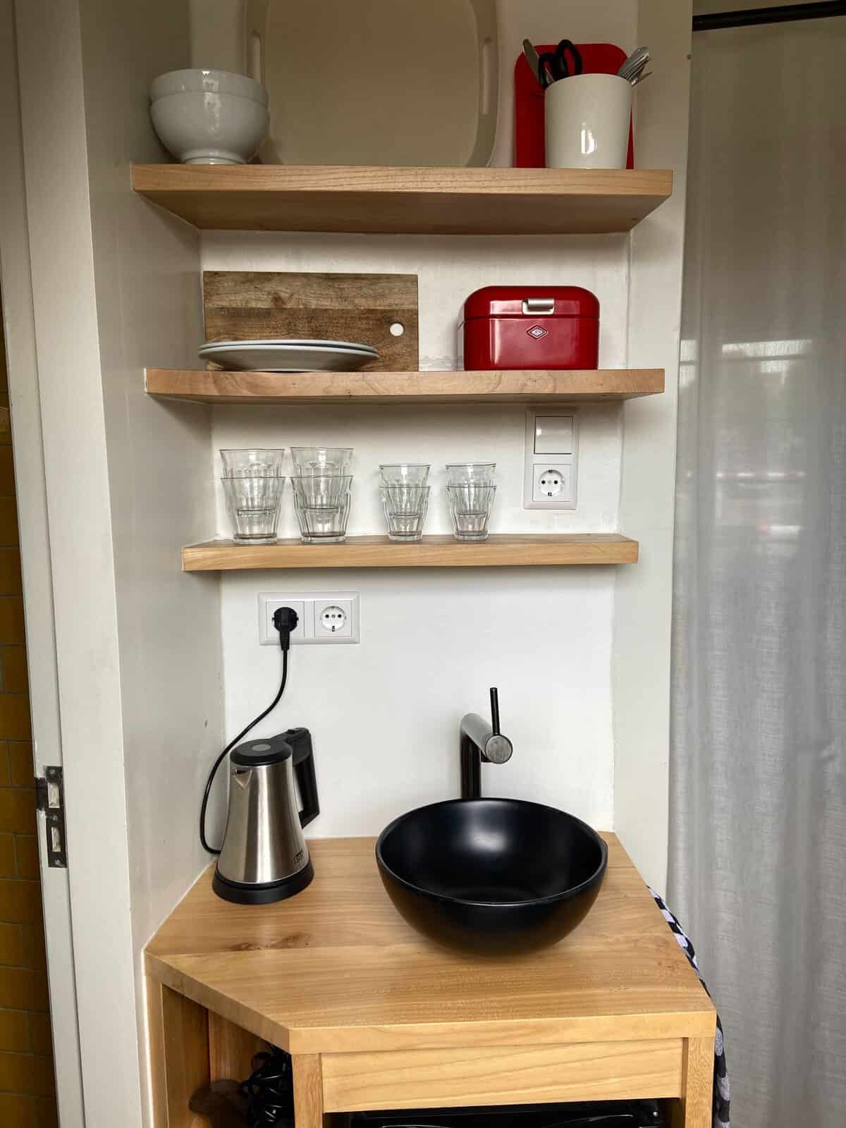 sweets hotel entryway with small sink