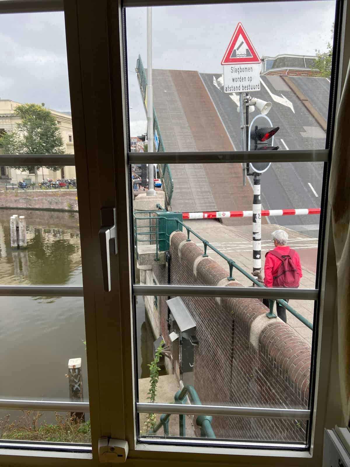 Where to Stay in Amsterdam: SWEETS Hotel Review 5 bridge going up over canal in amsterdam