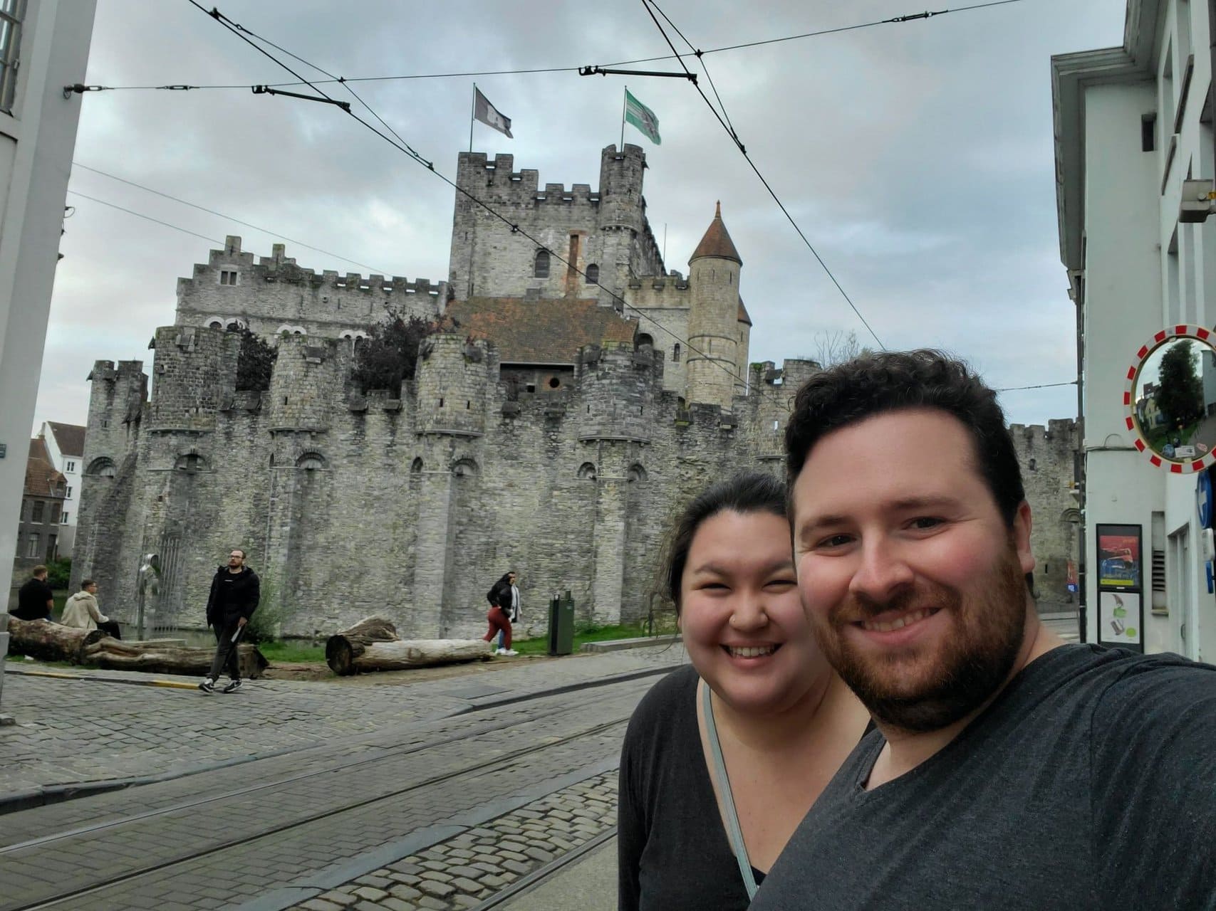 11+ Stunning Things to Do in Ghent, Belgium 34 Colin and Riana selfie in front of Gravensteen Castle in Ghent, Belgium