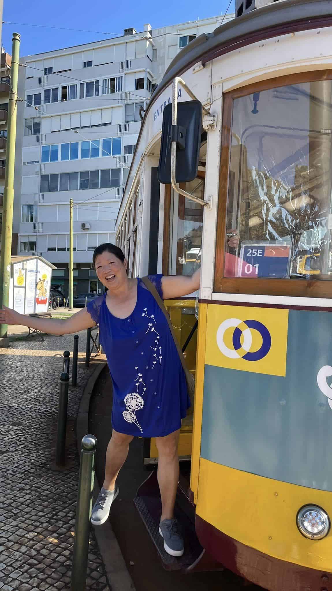 An 8 Week Spain and Portugal Itinerary With My Mom! 4 being silly on a tram in Lisbon, Portugal