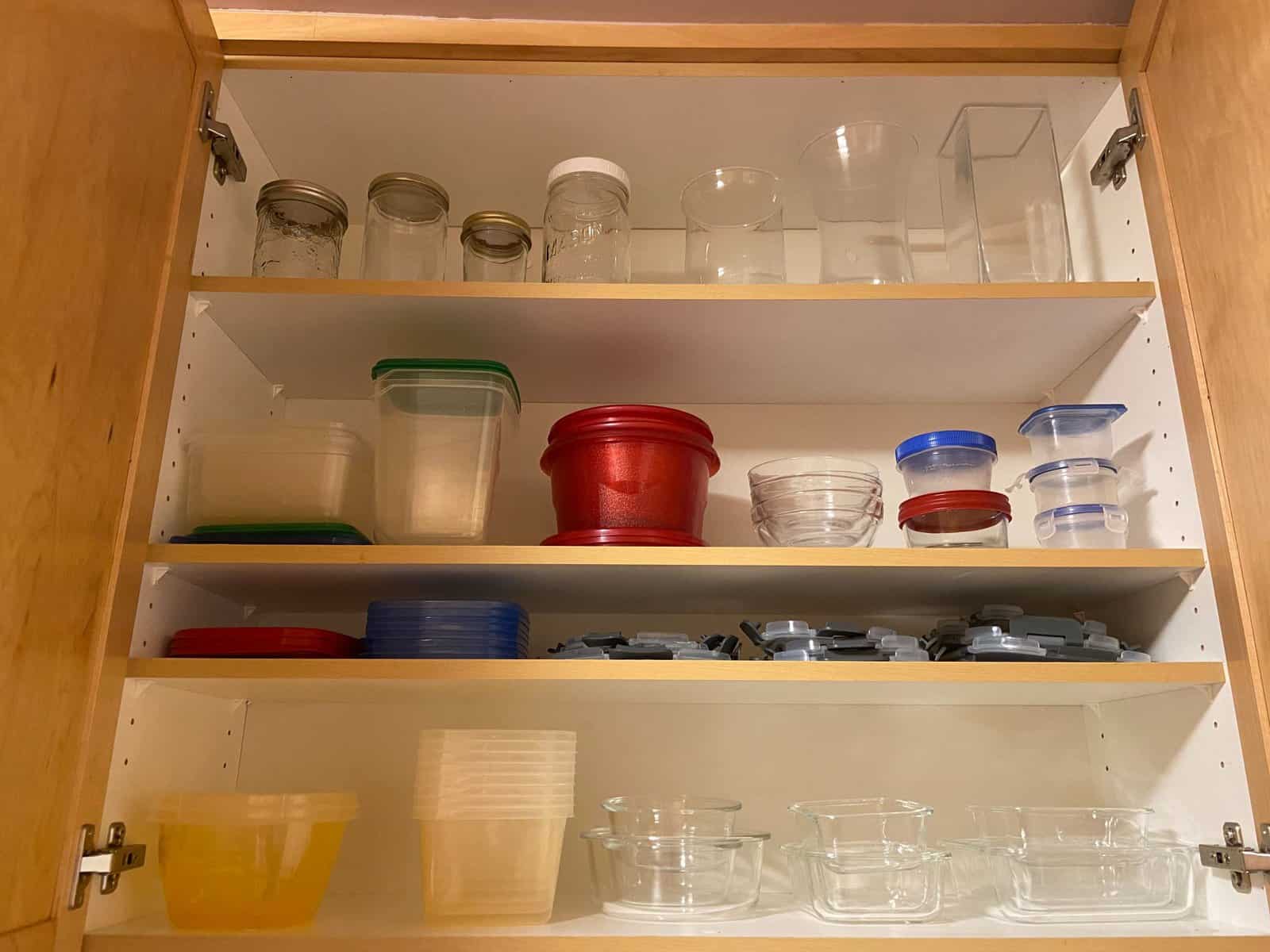 Welcome Home! Our New Vancouver Apartment Tour 6 tupperware cabinet in kitchen