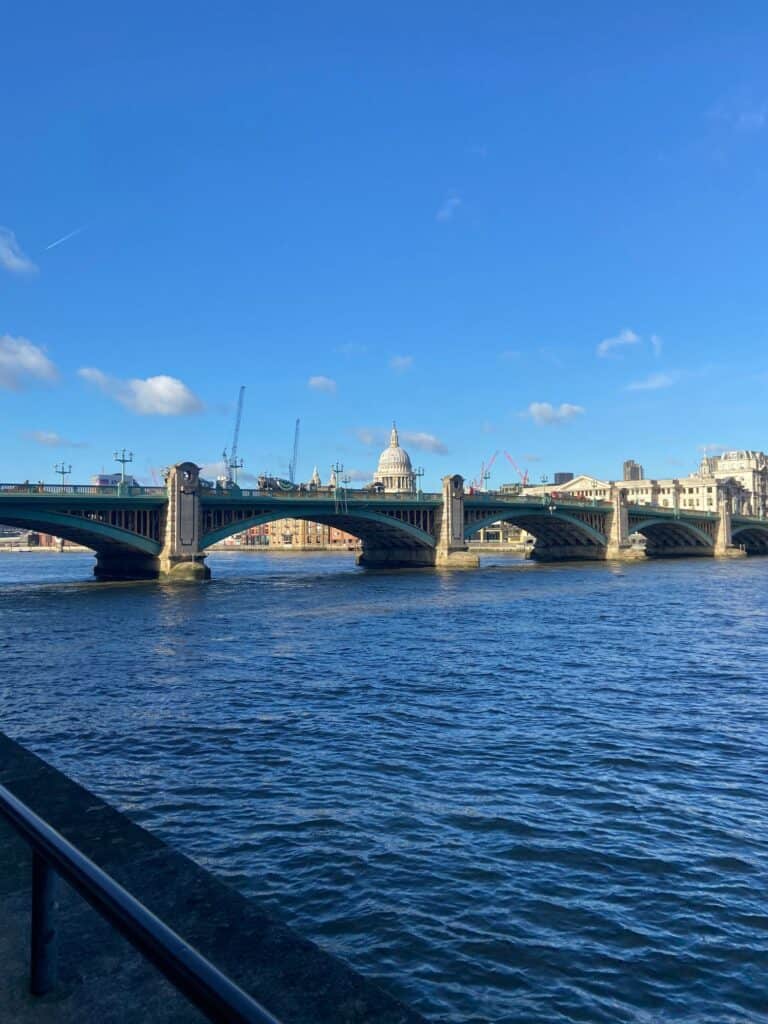 Why I Keep Returning to London 7 millenium bridge over the thames river in london
