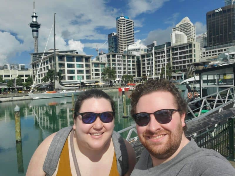 Selfie of Riana and Colin in Viaduct Harbour, Auckland, cost of a trip to New Zealand
