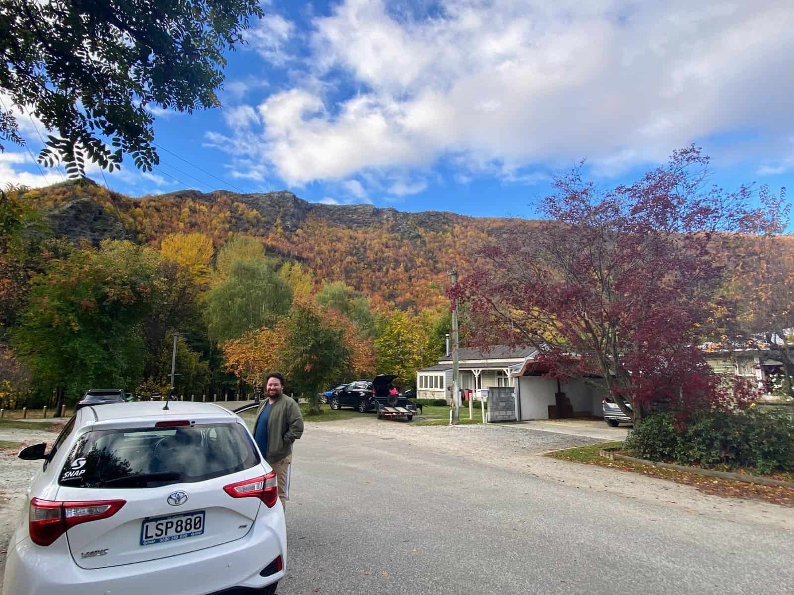 19 Things to Know Before You Plan a Trip to New Zealand 12 car rental in New Zealand, car parked in Arrowtown in Autumn