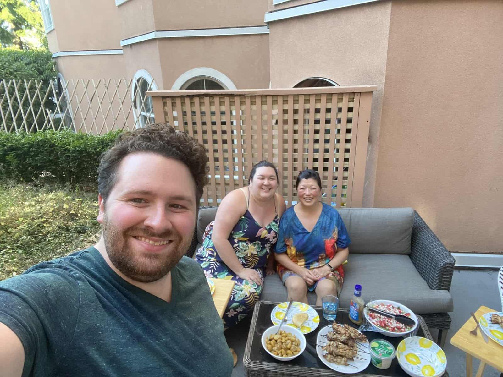 Selfie of Greek food dinner on our patio during summer 2023