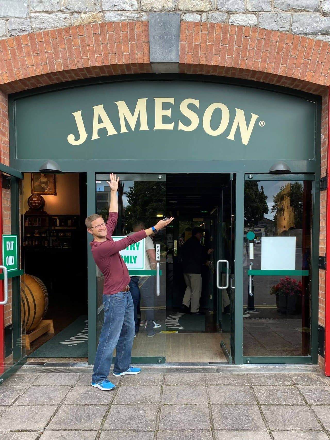 Traveller of the Month: Paul from Paul Passing Through 5 Paul in front of the Jameson Experience Tour in Ireland
