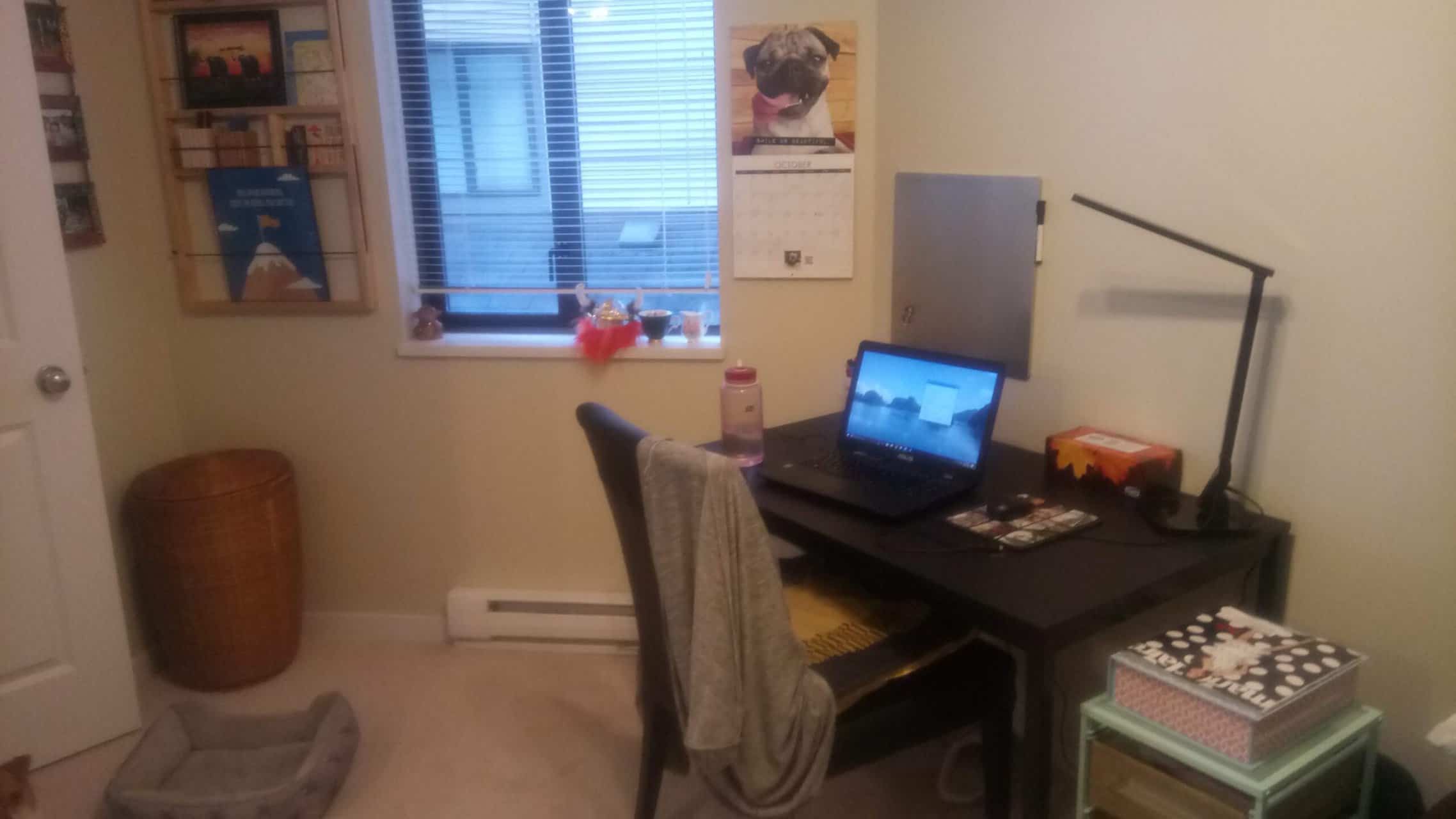 18 Freelancer Tips for Beginners (From an 8 Year Veteran!) 3 Riana's freelance office space in 2017 with a desk, chair and lots of decor on the walls