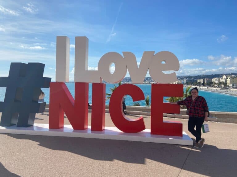 Riana standing in front of the #ILoveNice sign in Nice, France