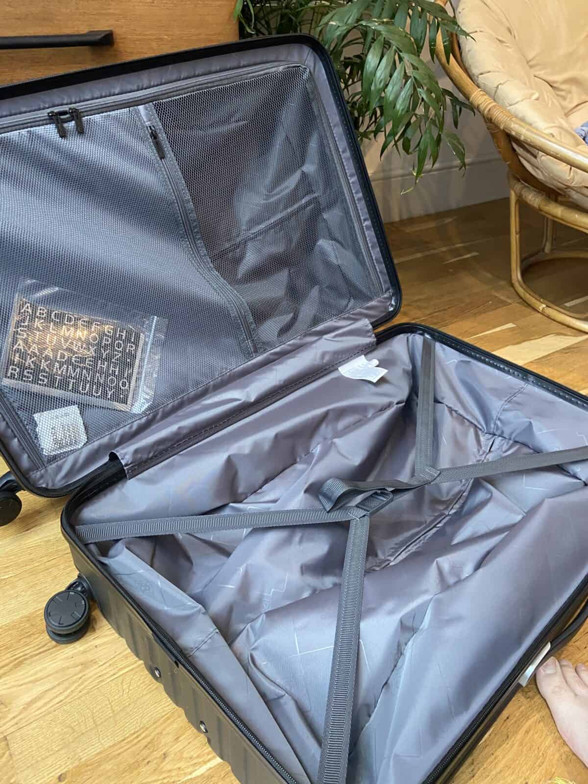 Our Essential Packing List for Travel with a Baby 9 LEVEL8 Grace 28" Hardside checked bag open on its side