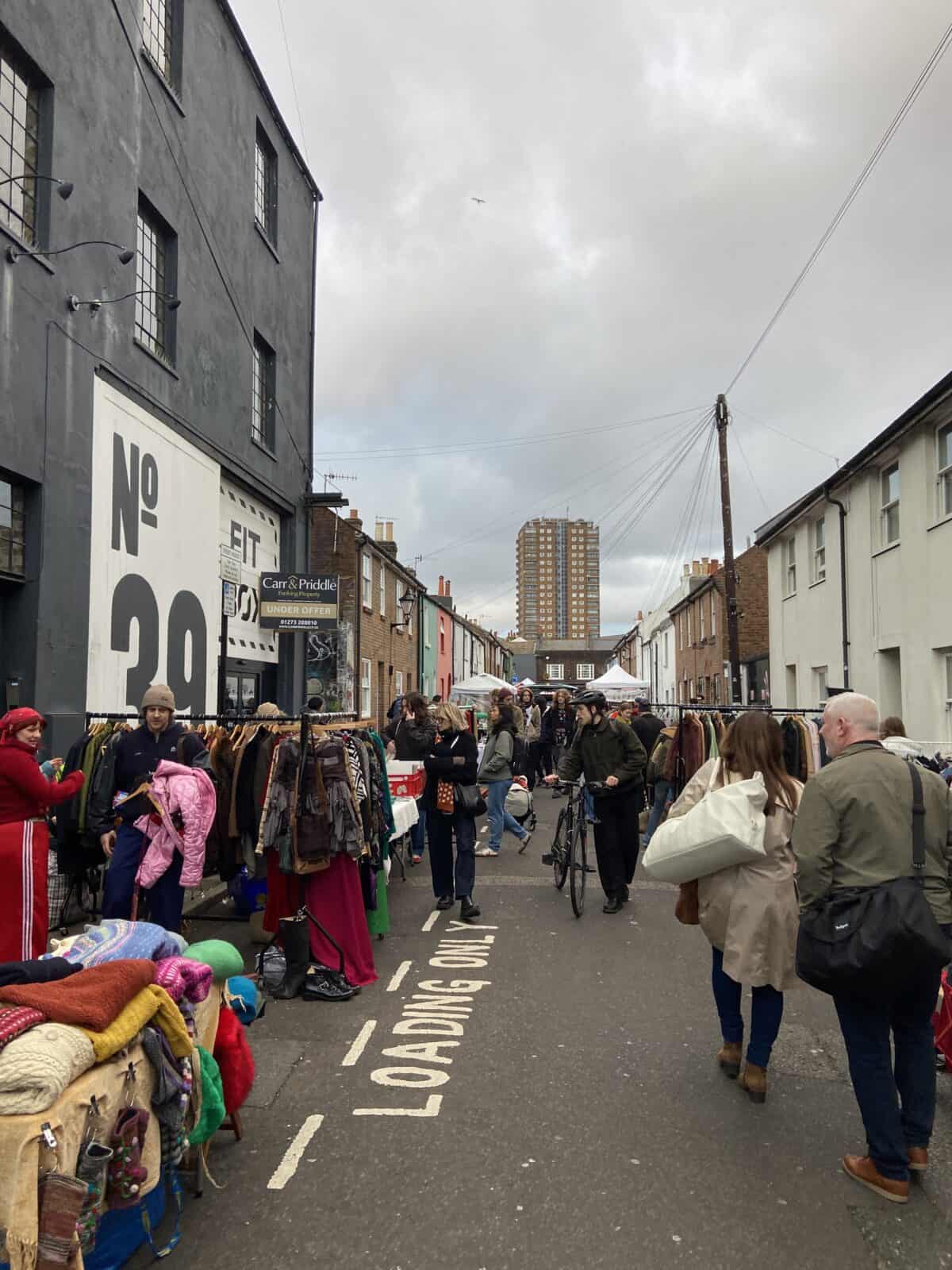 Your Guide to Brighton's North Laine 3 People shopping at the Saturday Outdoor Flea Market in North Laine, Brighton