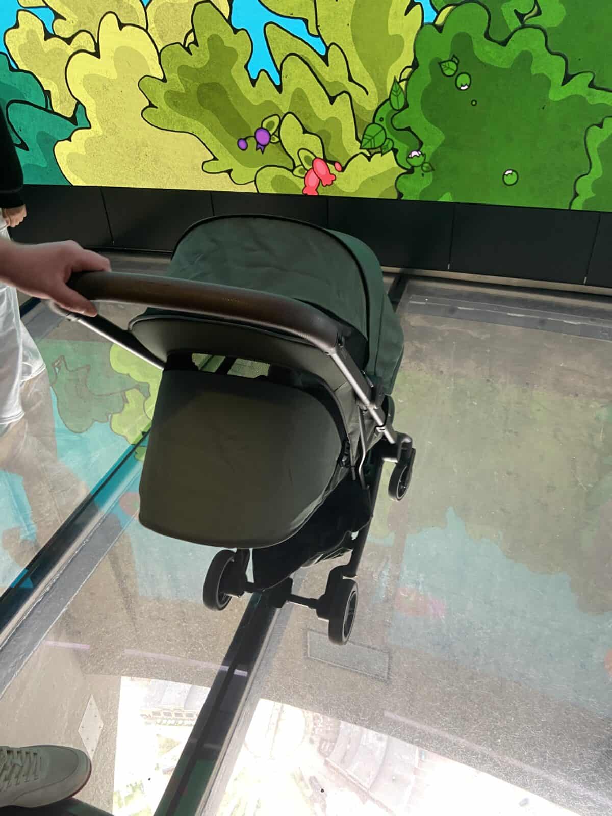 Joolz Aer Review: Is This the Best Travel Stroller? 4 Pushing our Joolz Aer travel stroller onto the glass floor inside the CN Tower in Toronto