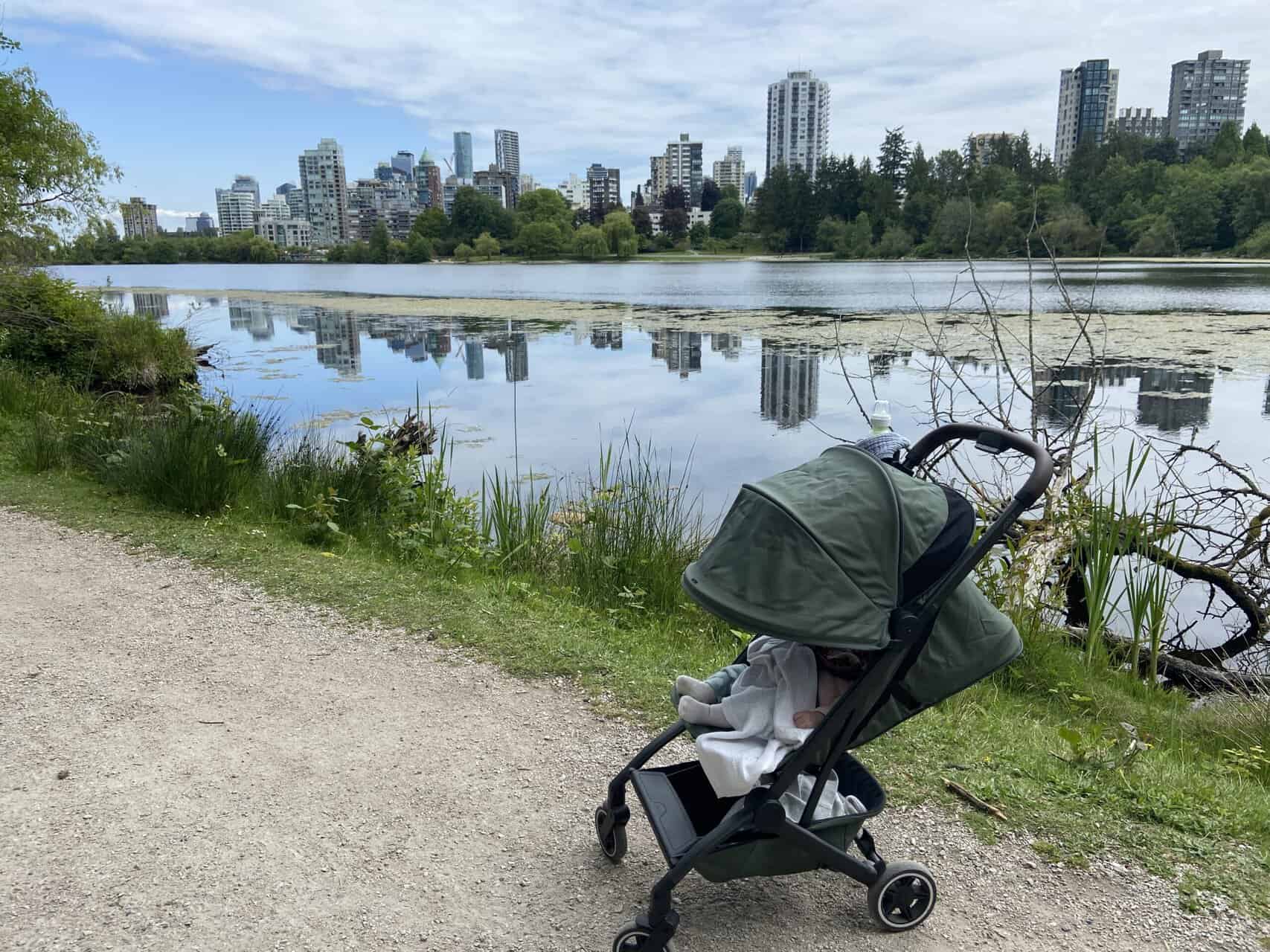 Joolz Aer Review: Is This the Best Travel Stroller? 7 Baby C in her Joolz Aer travel buggy with the canopy pulled low as she naps along Lost Lagoon in Stanley Park, Vancouver