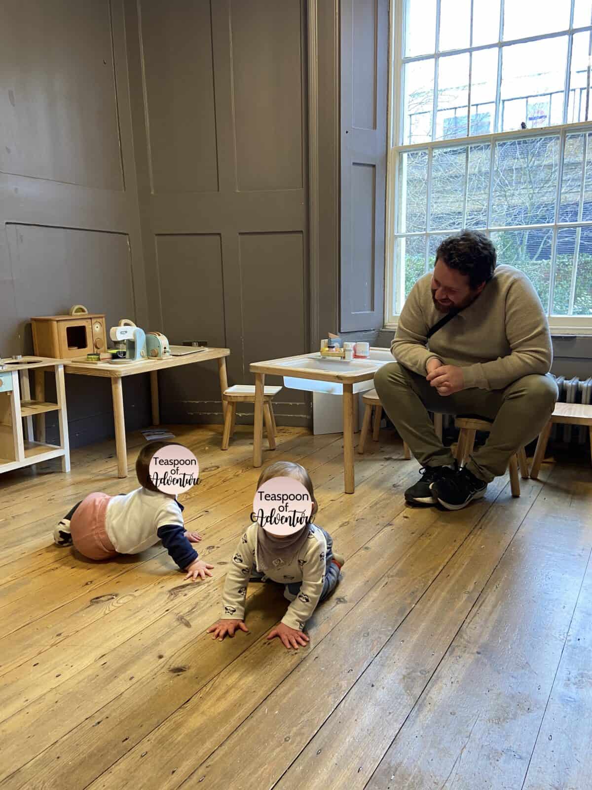 20+ Things to Do in London With a Baby 27 Colin with Baby C and another baby in the Reading Lounge & Sensory Den at Museum of the Home, London