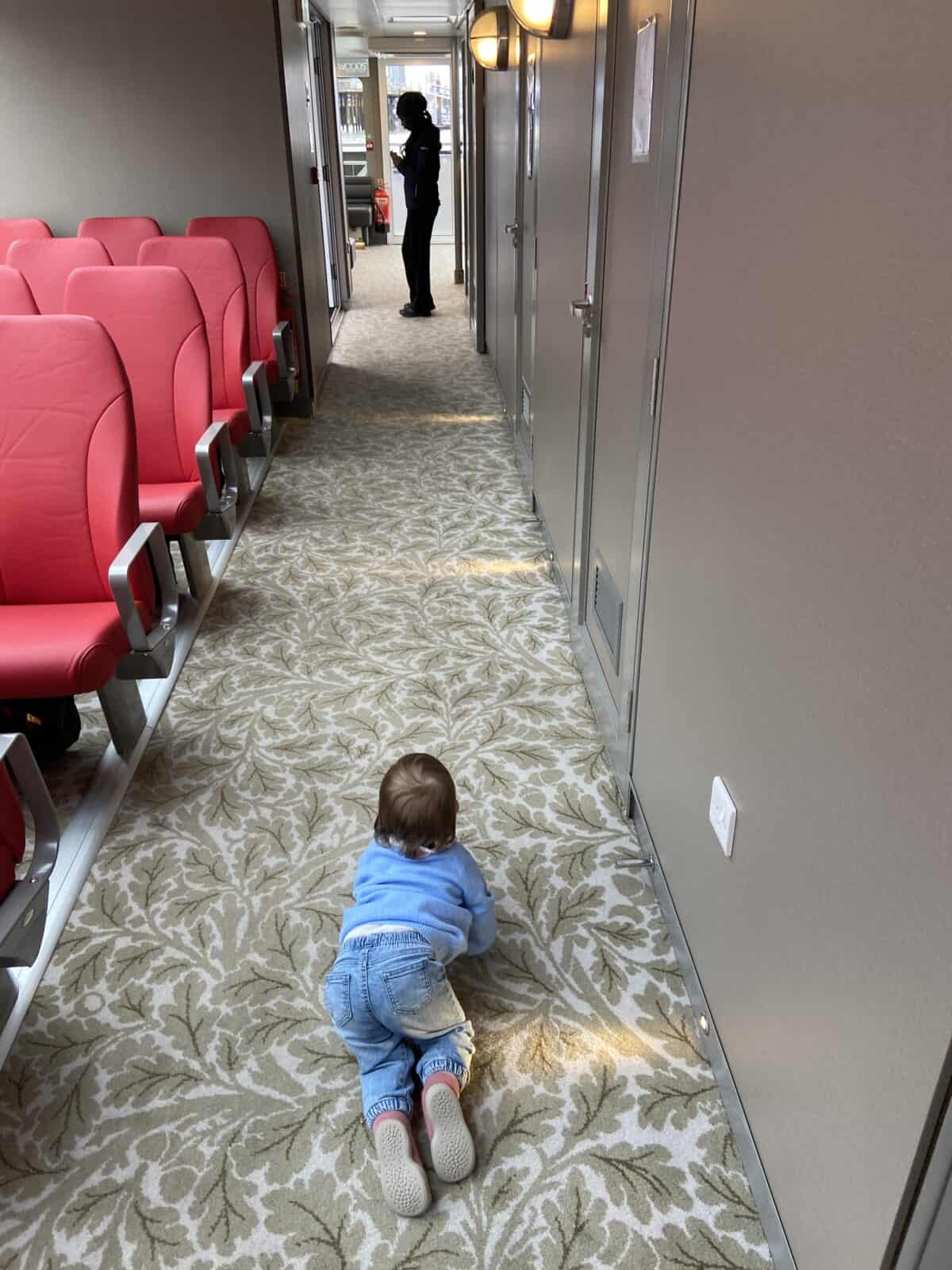 20+ Things to Do in London With a Baby 37 Baby C crawling around during a River Thames cruise aboard Tower of London River Tour