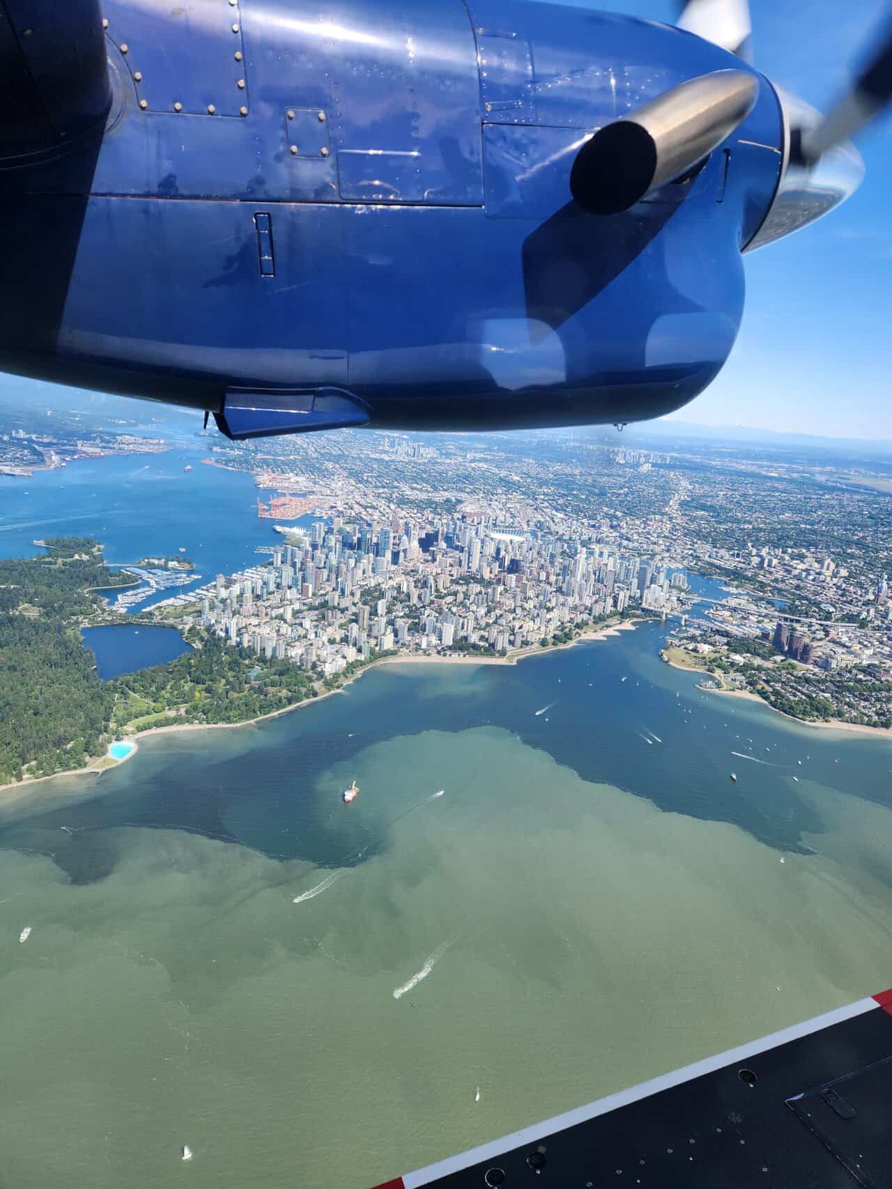 Should You Take a Seaplane to Victoria from Vancouver? (Harbour Air Review) 5 Beautiful view of islands, trees, city and coastline from the Harbour Air seaplane window