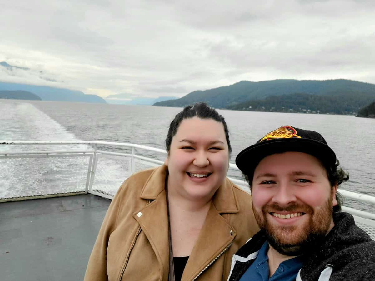 How to Get to Victoria from Vancouver, BC 9 Riana and Colin taking a selfie off the back of a BC Ferry boat between Victoria and Vancouver, Canada