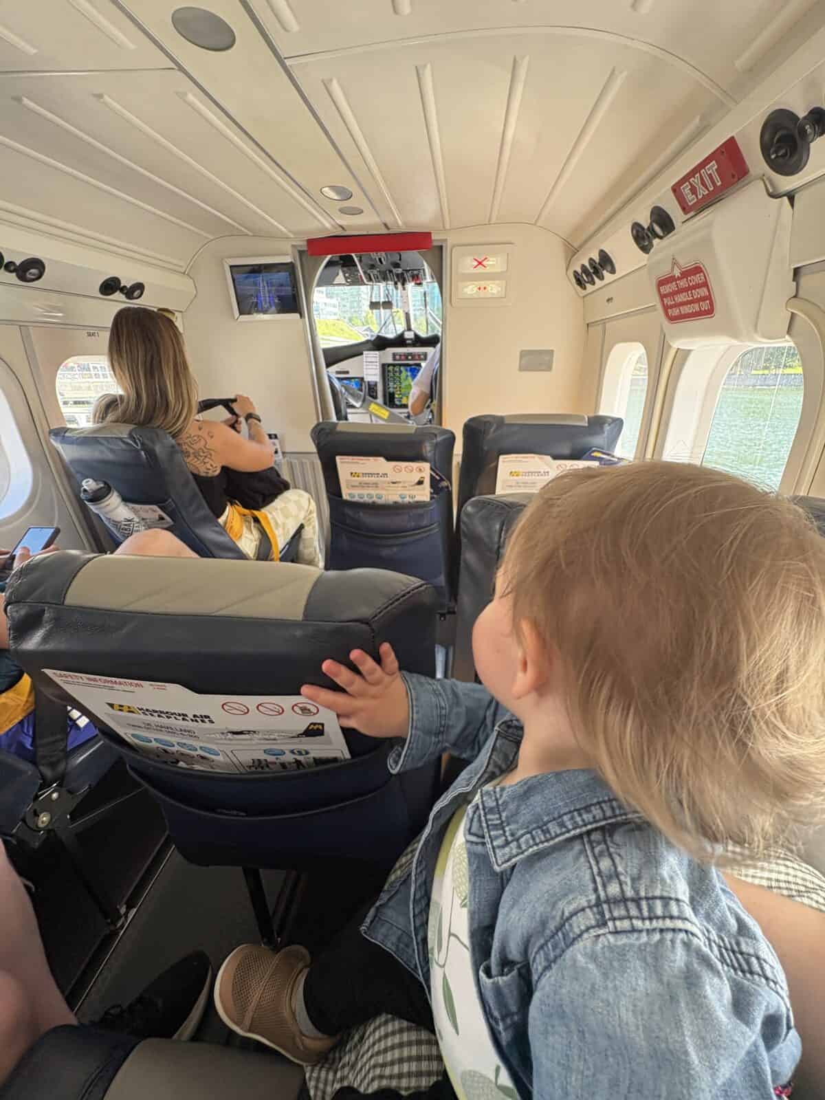 Should You Take a Seaplane to Victoria from Vancouver? (Harbour Air Review) 14 Baby C sitting on my lap in a Harbour Air seaplane to Victoria from Vancouver