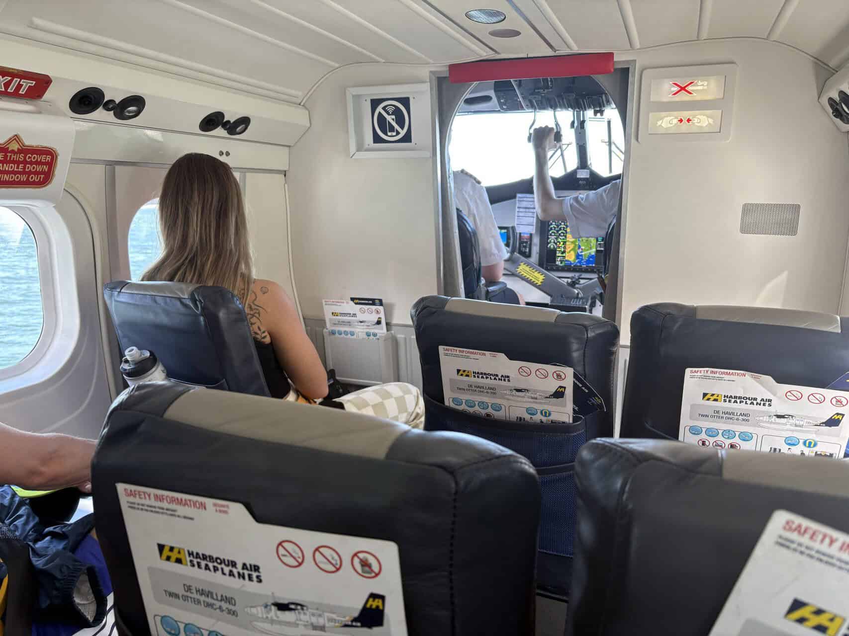 Should You Take a Seaplane to Victoria from Vancouver? (Harbour Air Review) 28 View inside a Harbour Air seaplane with the seats and pilots up front