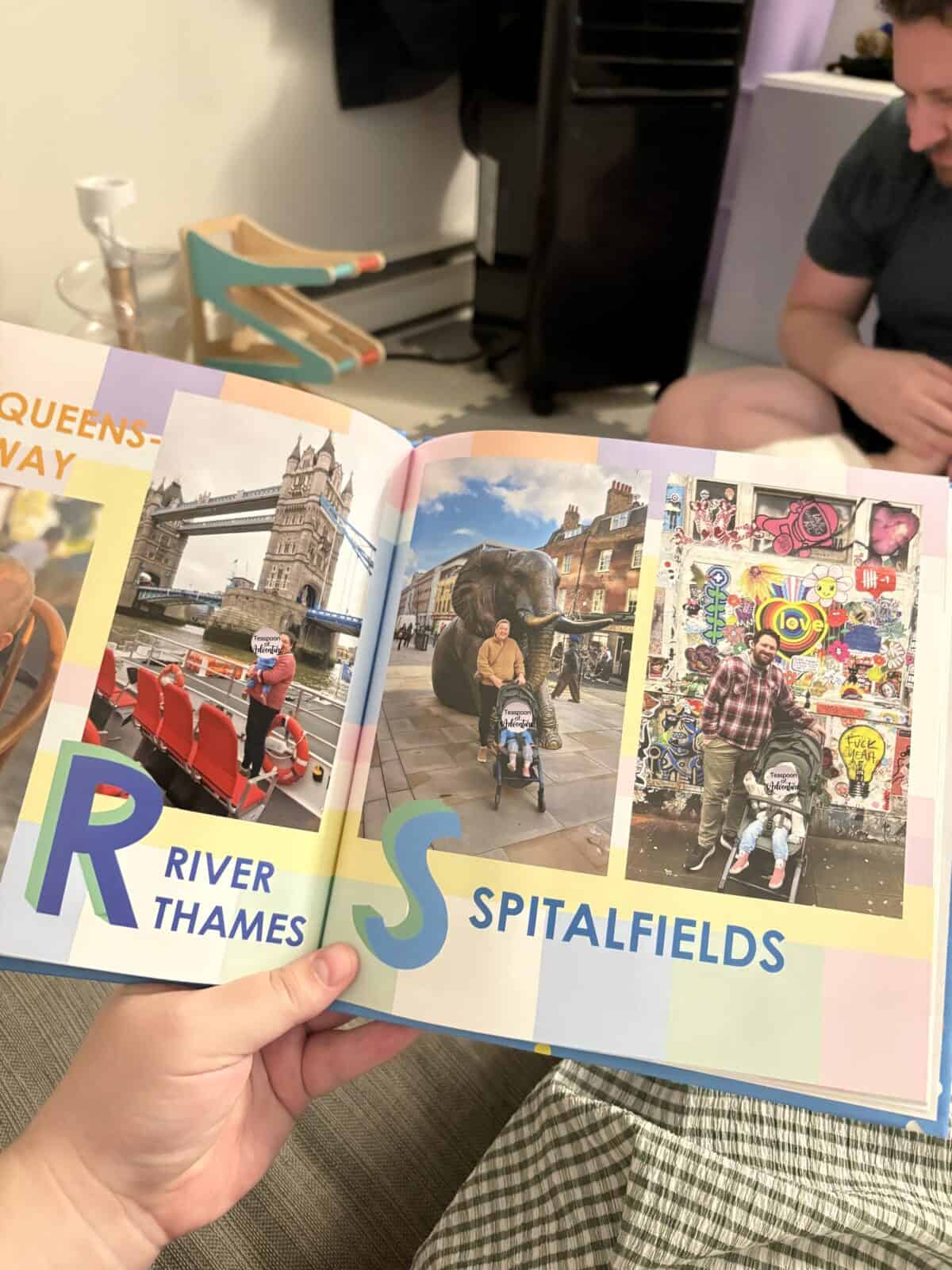 Making A Custom Board Book From Our Travel Photos 8 Holding open the custom board book I created with Mixbook, a travel alphabet book, on pages with the letters R and S and our travel photos