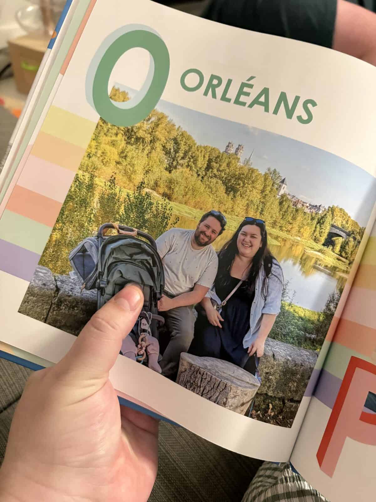 Making A Custom Board Book From Our Travel Photos 11 Inside page of our Travel ABCs custom board book on the letter "O" for Orleans with a family photo