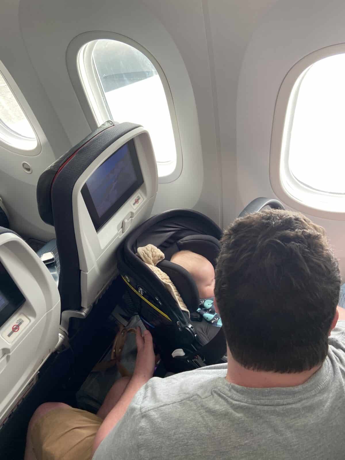 How to Get to Victoria from Vancouver, BC 17 Colin strapping Baby C's car seat into the plane seat