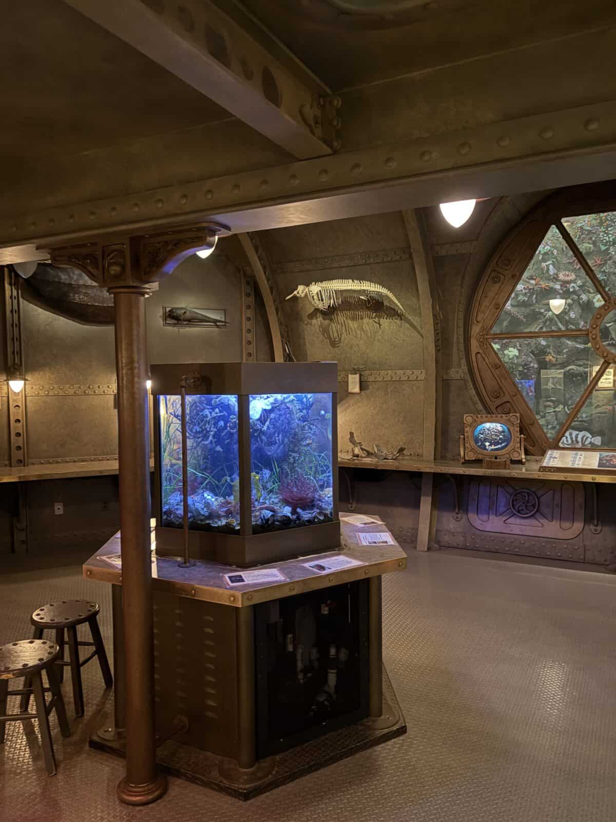 Inside Ocean Stage, a recreated submarine with portholes and tanks, at the Royal BC Museum